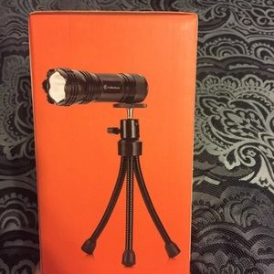 New in box flashlight with Tripod